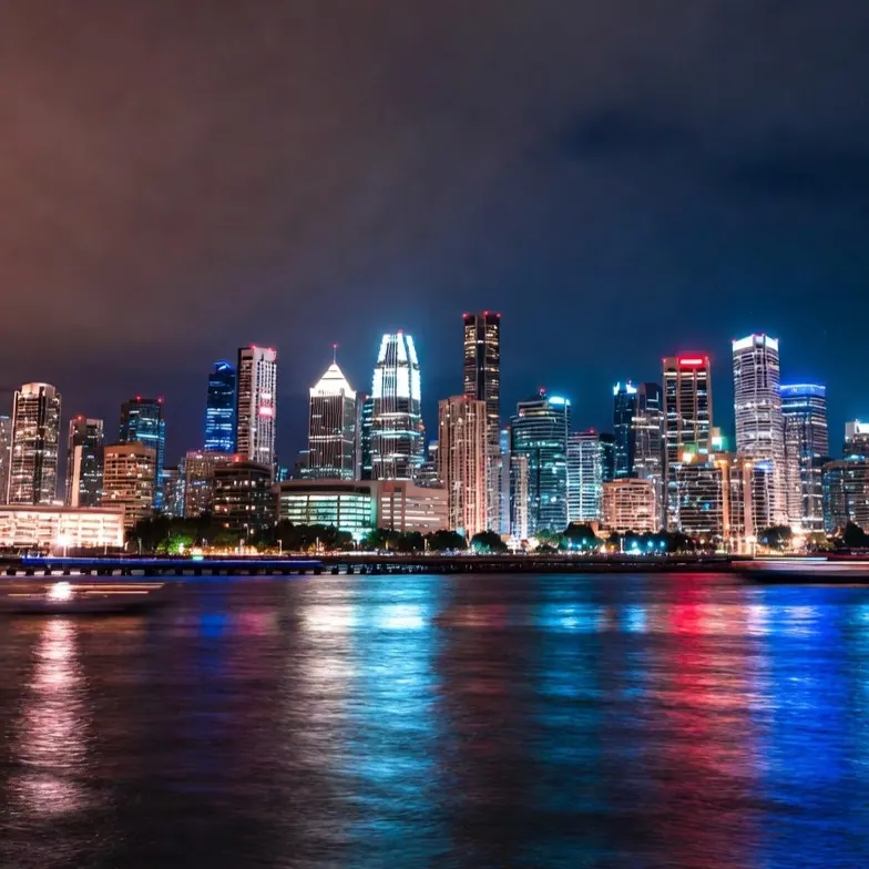 City skyline at night representing creator economy growth